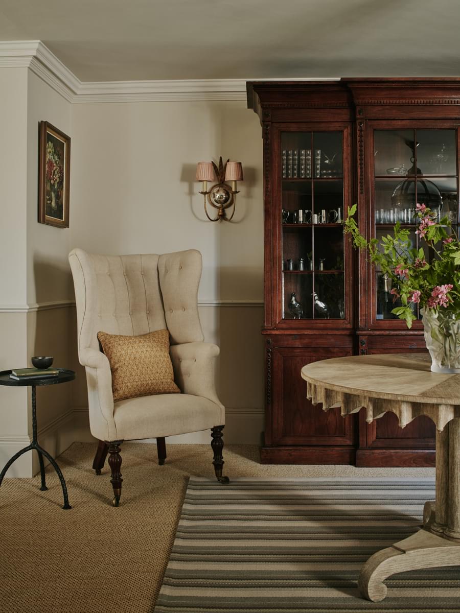 sims-hilditch-interior-design-17th-century-cotswolds-manor-hallway-armchair